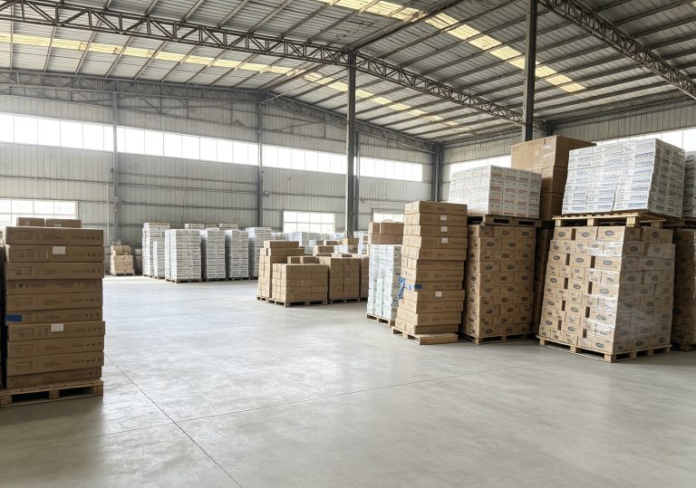 Wide warehouse view with palletized finished goods