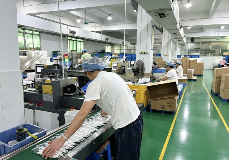 Quality control inspection on the food-container production line
