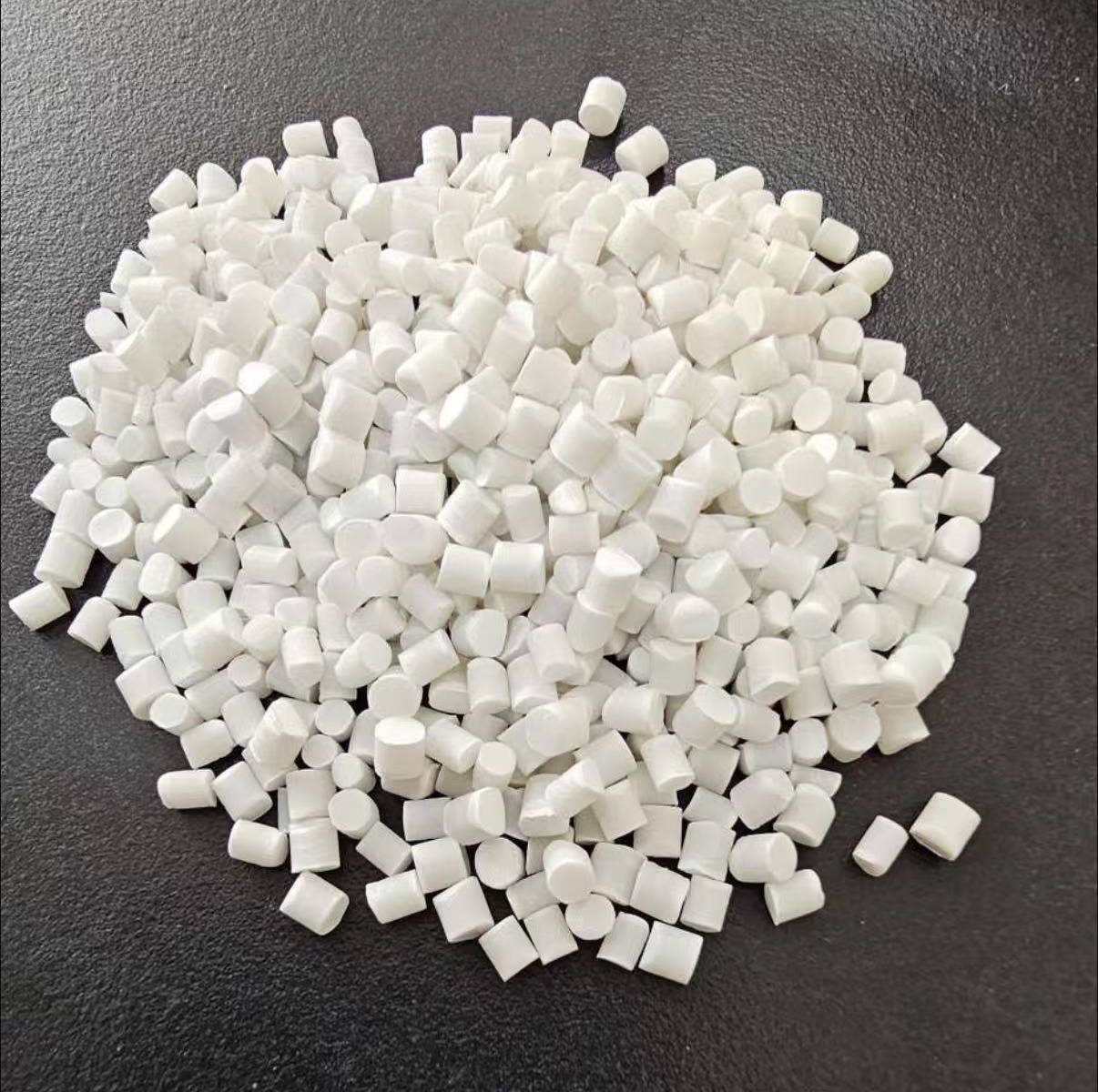 White resin pellets illustrating a packaging material review