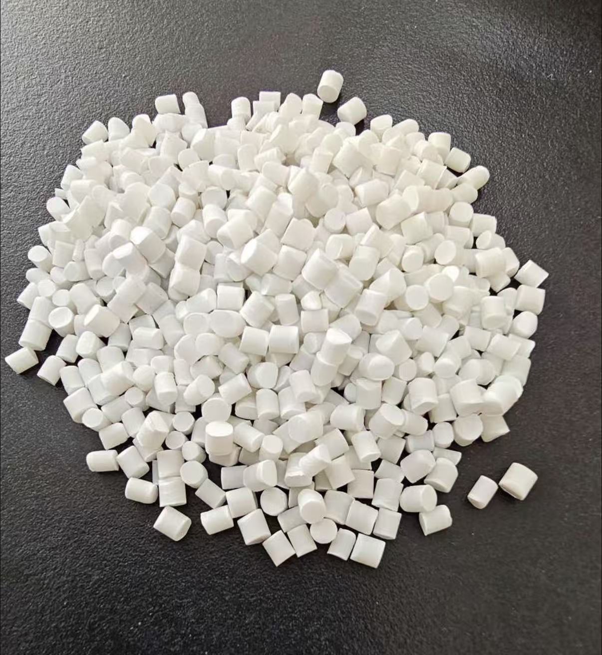 White resin pellets illustrating a packaging material review